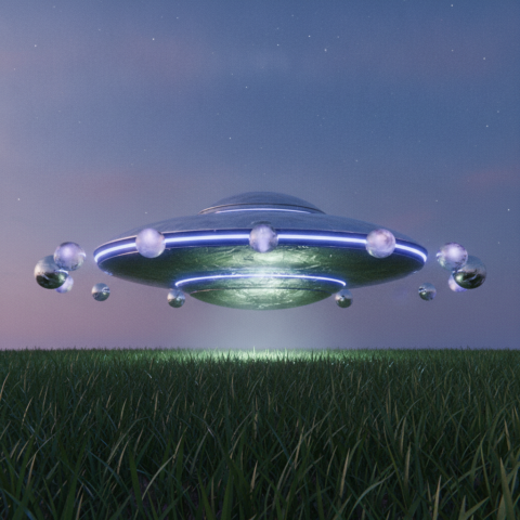 A silver metallic disc-shaped spacecraft with blue and purple rim lights hovers over a grassy plain at twilight.